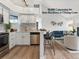 Well-lit kitchen showcasing stainless steel appliances and white cabinets at 11195 Alcott St # D, Westminster, CO 80234