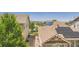 Rooftop solar panels on a home nestled in a suburban neighborhood at 7845 S Flat Rock Way, Aurora, CO 80016