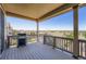 Spacious deck with a grill, ideal for outdoor entertaining at 7845 S Flat Rock Way, Aurora, CO 80016