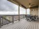 Enjoy outdoor living on this large deck with railing and expansive neighborhood views at 7845 S Flat Rock Way, Aurora, CO 80016