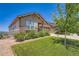 Beautiful home with well-manicured lawn and stone facade at 7845 S Flat Rock Way, Aurora, CO 80016