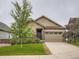 Charming single-Gathering home with two-car garage, landscaped yard, and inviting curb appeal at 7845 S Flat Rock Way, Aurora, CO 80016