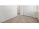 Cozy bedroom featuring a closet and neutral carpeting, offering a calming retreat with ample storage and a bright ambiance at 350 S Clinton St # 2A, Denver, CO 80247