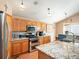 Well-equipped kitchen with stainless steel appliances, granite countertops, and ample cabinet space for storage at 11302 W Prentice Dr, Littleton, CO 80127