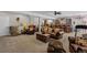 Living room featuring a cozy lounge area with seating and a bar area for entertaining at 3748 Starry Night Loop, Castle Rock, CO 80109