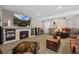 Relaxing living room features a fireplace and inviting seating area at 3748 Starry Night Loop, Castle Rock, CO 80109