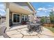 Inviting outdoor patio with ample seating, perfect for alfresco dining and relaxation in a serene backyard setting at 3748 Starry Night Loop, Castle Rock, CO 80109