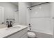 Clean bathroom with white tile shower and modern fixtures at 1839 Morgan Dr, Erie, CO 80516