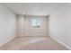 Bedroom featuring carpet and natural lighting from window at 1839 Morgan Dr, Erie, CO 80516