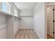 Walk-in closet with carpet, door and windows at 1839 Morgan Dr, Erie, CO 80516