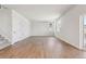 Spacious living room with wood floors and bright, natural light at 1839 Morgan Dr, Erie, CO 80516