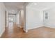 Bright and airy living room featuring hardwood floors and neutral paint at 1839 Morgan Dr, Erie, CO 80516