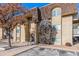 Exterior shot of apartment building with landscaping and parking at 7375 E Quincy Ave # 202, Denver, CO 80237