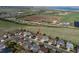 Aerial view of the neighborhood, showcasing the house and its surrounding green spaces at 9362 S Holland Way, Littleton, CO 80127