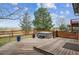 Backyard deck with beautiful mountain views, offering an ideal spot for relaxation and outdoor enjoyment at 9362 S Holland Way, Littleton, CO 80127