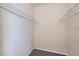 Walk-in closet with metal shelving and carpeted floor at 4451 S Ammons St # 1-304, Littleton, CO 80123
