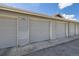 Gray garages with numbers 8 and 9 labeled on them at 4451 S Ammons St # 1-304, Littleton, CO 80123