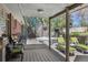 Inviting backyard deck with a hot tub, lounge chairs, and outdoor seating, ideal for relaxing and entertaining at 1196 S Quebec Way, Denver, CO 80231