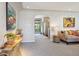 Living room featuring neutral colors, modern decor, and an open concept design at 1196 S Quebec Way, Denver, CO 80231