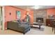 Living room with fireplace, sofa, and decor, creating a welcoming space for relaxation at 1196 S Quebec Way, Denver, CO 80231
