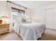 Cozy bedroom with a comfortable bed, neutral colors, and natural light from the window at 3 Winged Foot Way, Littleton, CO 80123