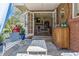 Inviting outdoor space with a patio, furniture, and charming decor at 3 Winged Foot Way, Littleton, CO 80123