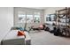 Bright bonus room with large windows and plenty of space for workout equipment or lounging at 2862 E 103Rd Ave, Denver, CO 80229