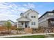 Inviting home with fenced yard and a charming front porch, perfect for relaxing outdoors at 2862 E 103Rd Ave, Denver, CO 80229