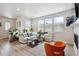 Comfortable living room with cozy seating and ample natural light, creating a welcoming space at 2862 E 103Rd Ave, Denver, CO 80229
