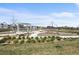 Community playground featuring modern equipment, open spaces, and seating areas at 2862 E 103Rd Ave, Denver, CO 80229