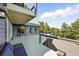 Spacious back deck with nice railings overlooking surrounding nature at 31 Wild Tiger Ln, Boulder, CO 80302