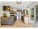 Well-equipped kitchen featuring stainless steel appliances, granite countertops, modern cabinetry, and hardwood floors at 31 Wild Tiger Ln, Boulder, CO 80302