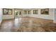 Spacious living area with tile flooring, large windows, and a sliding glass door at 31 Wild Tiger Ln, Boulder, CO 80302