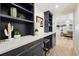Stylish office area with built-in shelves, ample storage, and a comfortable workspace at 31 Wild Tiger Ln, Boulder, CO 80302