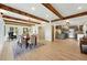 Spacious open-concept layout with a dining area flowing into a kitchen, perfect for entertaining guests and Gathering at 31 Wild Tiger Ln, Boulder, CO 80302