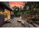 Beautiful patio with a fire pit and chairs, perfect for outdoor entertaining and relaxation at 31 Wild Tiger Ln, Boulder, CO 80302