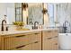 Stylish bathroom with dual vanities, sleek black fixtures, and elegant tile accents at 1057 English Sparrow Trl, Highlands Ranch, CO 80129