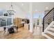 Open-concept kitchen featuring a center island, modern appliances, and stylish lighting, perfect for entertaining and everyday living at 1057 English Sparrow Trl, Highlands Ranch, CO 80129