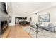 Open living space with hardwood floors and modern kitchen at 1555 Perry St, Denver, CO 80204