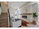 Bright living room featuring a fireplace, hardwood floors, and modern decor at 1372 Lowell Blvd # 2, Denver, CO 80204