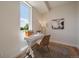 Bright home office with a modern desk, comfortable chair, and natural light at 1372 Lowell Blvd # 2, Denver, CO 80204