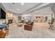 Open basement area with a fireplace, seating, and a bar, ideal for entertaining guests at 10994 Shadowbrook Cir, Highlands Ranch, CO 80130