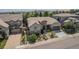 Beautiful home with stone accents, lush landscaping, and a well-manicured lawn at 10994 Shadowbrook Cir, Highlands Ranch, CO 80130