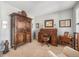 Charming office space featuring a wooden desk, an armoire, and elegant decor at 10994 Shadowbrook Cir, Highlands Ranch, CO 80130