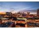 Night aerial view of downtown skyline and adjacent residential neighborhood at 1521 Central St # 2B, Denver, CO 80211