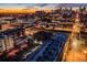 Stunning night aerial view of city with beautiful sunset and city lights at 1521 Central St # 2B, Denver, CO 80211