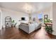 Bright living room featuring hardwood floors, modern furnishings, and an open floor plan at 1521 Central St # 2B, Denver, CO 80211