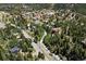 Scenic aerial view of a small town nestled among trees and a river running through the valley at 205 Loop Dr, Georgetown, CO 80444