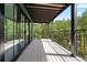 Spacious balcony with metal railing and tree views at 205 Loop Dr, Georgetown, CO 80444