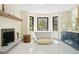 Elegant bathroom with a soaking tub, walk-in shower, modern fixtures, and great light at 205 Loop Dr, Georgetown, CO 80444